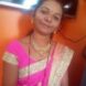 Traditional Indian attire portrait featuring a pink saree with gold lace border and matching gold necklace.