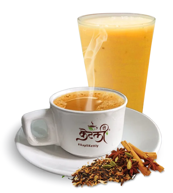 Hot masala chai in a white cup and a tall glass of tea with whole spices like cinnamon and star anise.