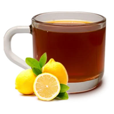 KT-Masala-Lemon-Tea Glass cup of hot lemon tea with fresh whole and sliced lemons and green leaves