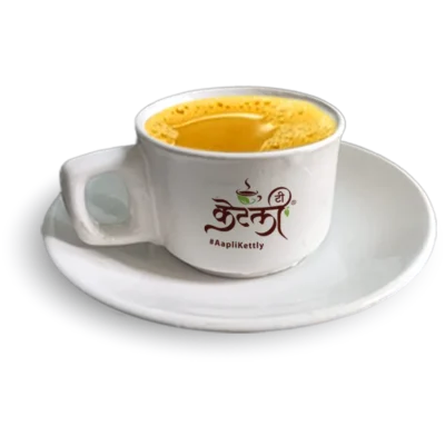KT-Sugar-Less-Tea Aapli Kettly white ceramic cup and saucer filled with hot Masala tea